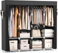 Schwarzer faltbarer Stoffkleiderschrank mit vier Kleiderstangen und Ablageboeden, abgedeckter Stauraum 170 x 45 x 167 cm fuer Keller und Schlafzimmer